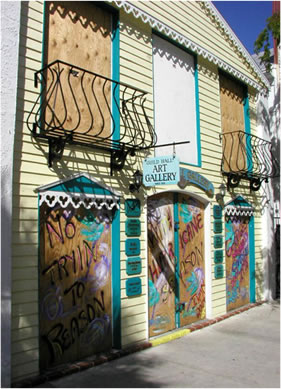 Graffiti on boards at the Guild Hall Art Gallery during evacuation for Hurricane Ivan : Key West, Florida Credit: Dale M. McDonald Florida Electronic Library. 